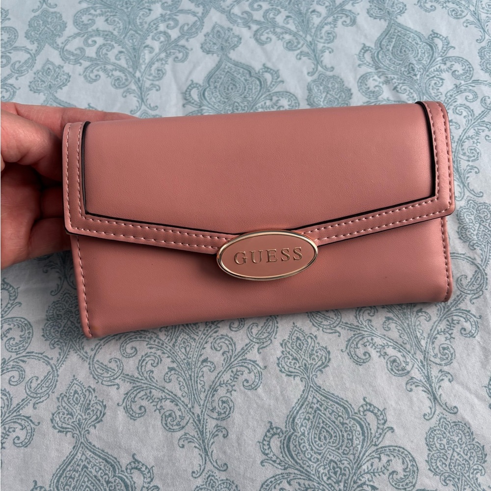 Guess trifold blush pink clutch wallet.